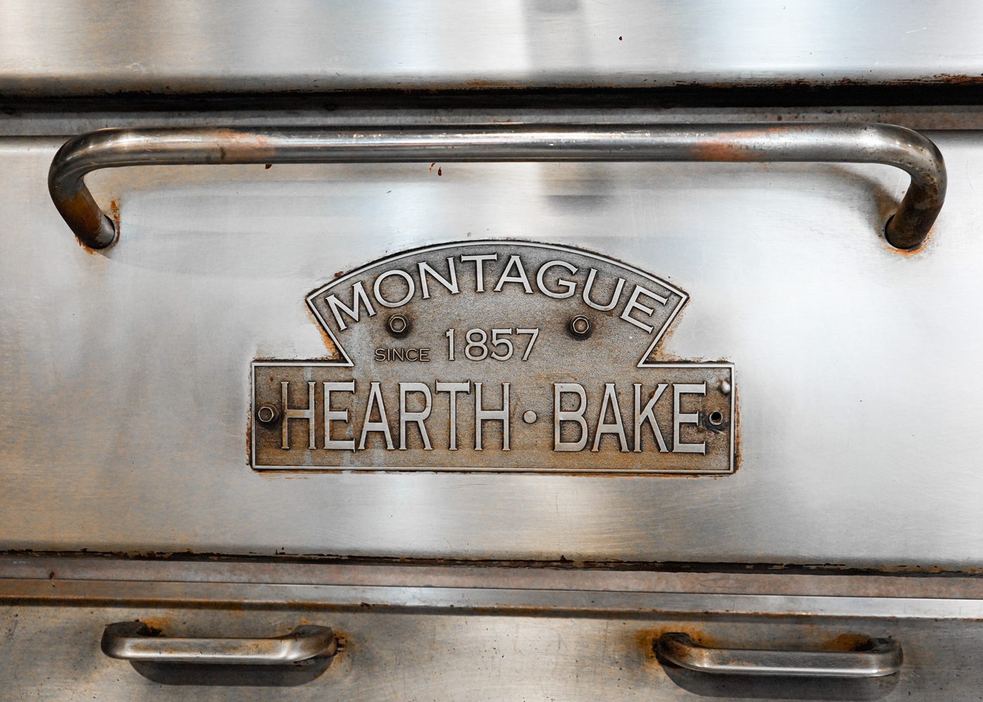 The door of the hearth oven at the back of the shop